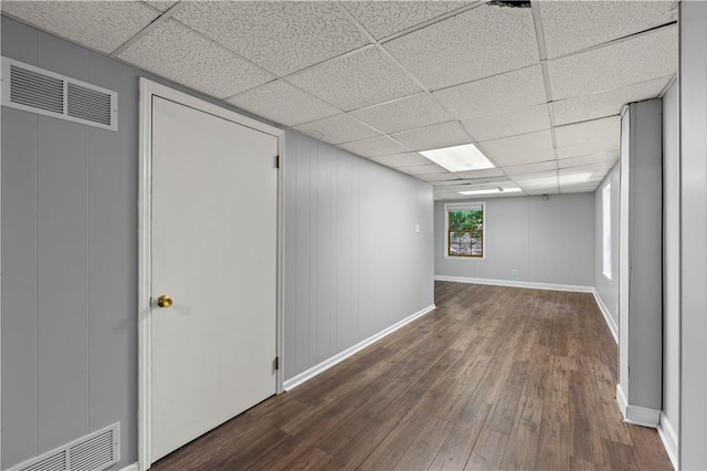 650 Crestview Ter, Gainesville, GA 30501 - empty room with dark wood-style flooring and a paneled ceiling