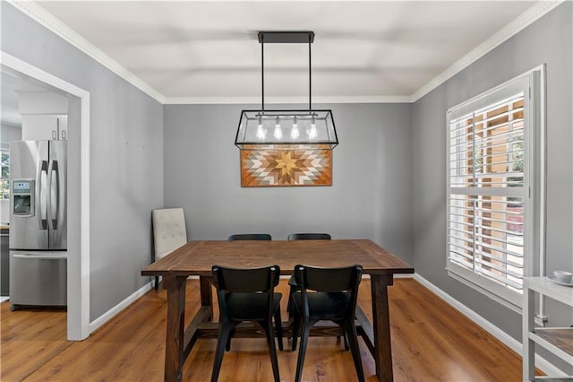 650 Crestview Ter, Gainesville, GA 30501 - dining space with light wood-style floors and ornamental molding