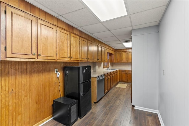 650 Crestview Ter, Gainesville, GA 30501 - kitchen with dishwasher, freestanding refrigerator, a drop ceiling, brown cabinets, and dark wood finished floors