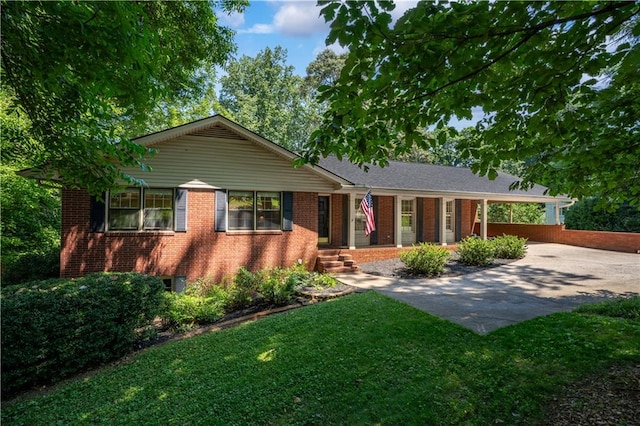 650 Crestview Ter, Gainesville, GA 30501 - ranch-style home with concrete driveway, brick siding, a front yard, and a carport