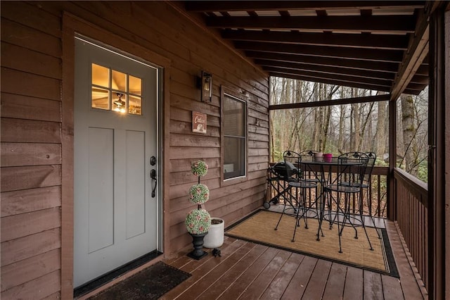 entrance to property with outdoor dining area