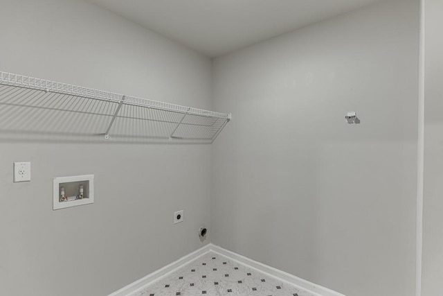 clothes washing area featuring laundry area, hookup for a washing machine, baseboards, and hookup for an electric dryer