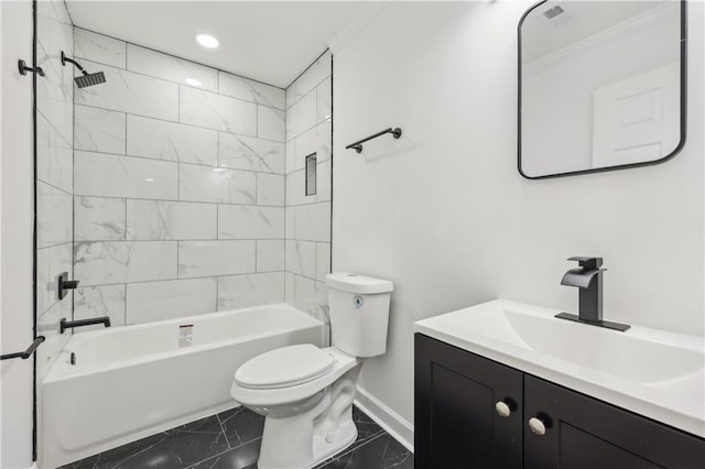 full bathroom featuring tiled shower / bath, vanity, crown molding, and toilet