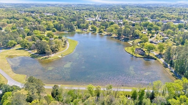aerial view of property and surrounding area with a large body of water