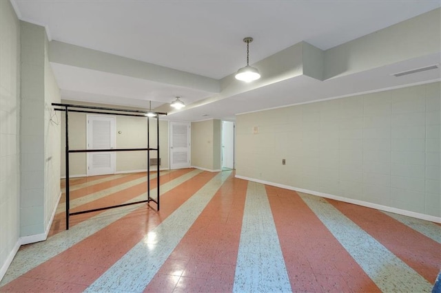 below grade area featuring baseboards