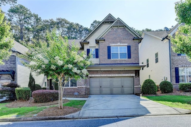 4335 Bellview Ln, Duluth, GA 30097 - craftsman-style house with brick siding, an attached garage, and driveway