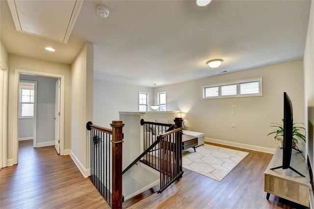4335 Bellview Ln, Duluth, GA 30097 - hall with attic access, an upstairs landing, healthy amount of natural light, wood finished floors, and recessed lighting