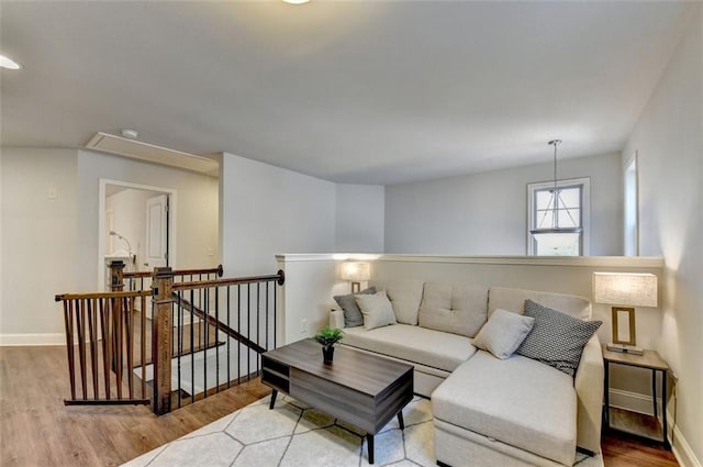 4335 Bellview Ln, Duluth, GA 30097 - living area featuring wood finished floors and attic access