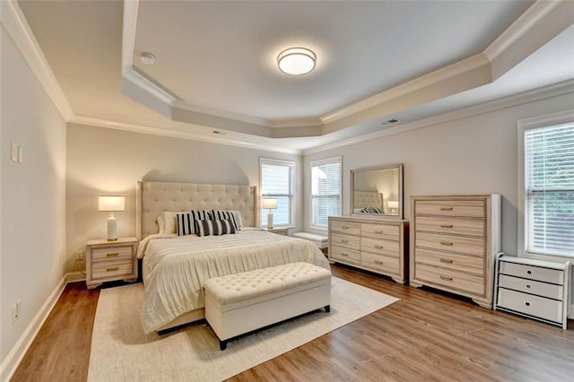 4335 Bellview Ln, Duluth, GA 30097 - bedroom featuring a raised ceiling, crown molding, and wood finished floors