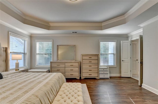 4335 Bellview Ln, Duluth, GA 30097 - bedroom featuring a raised ceiling, crown molding, and dark wood-style flooring