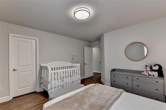 4335 Bellview Ln, Duluth, GA 30097 - bedroom with baseboards and wood finished floors