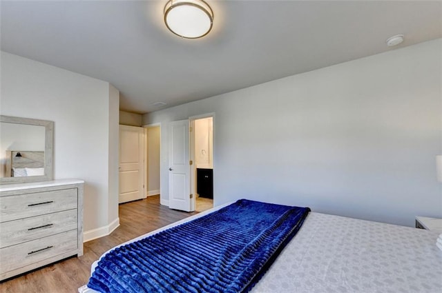 4335 Bellview Ln, Duluth, GA 30097 - bedroom with wood finished floors and baseboards