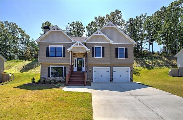 311 Arbor Cir, Rockmart, GA 30153 - view of front of home with stone siding, an attached garage, driveway, and a front yard