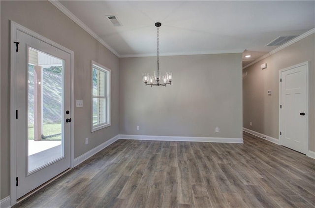 311 Arbor Cir, Rockmart, GA 30153 - unfurnished dining area with crown molding, a chandelier, and wood finished floors