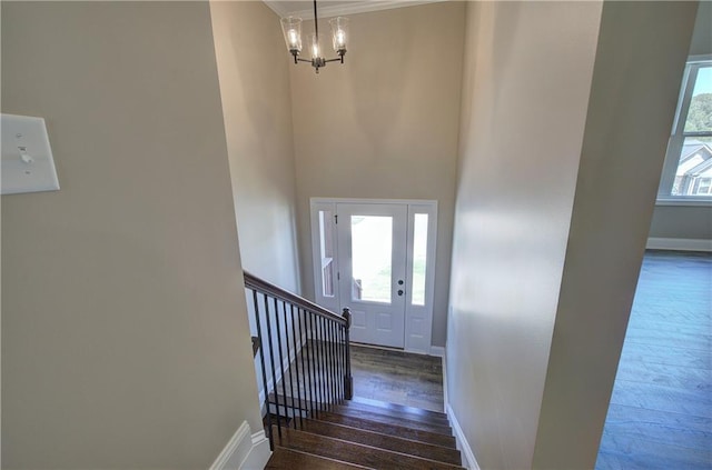 311 Arbor Cir, Rockmart, GA 30153 - entryway featuring a chandelier, wood finished floors, and stairway
