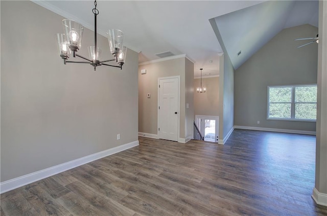311 Arbor Cir, Rockmart, GA 30153 - spare room with a chandelier, dark wood-style flooring, crown molding, and lofted ceiling