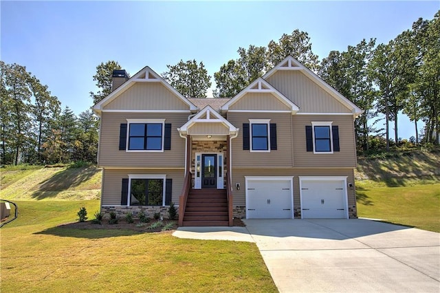 311 Arbor Cir, Rockmart, GA 30153 - view of front of home with stone siding, a garage, a chimney, and a front lawn