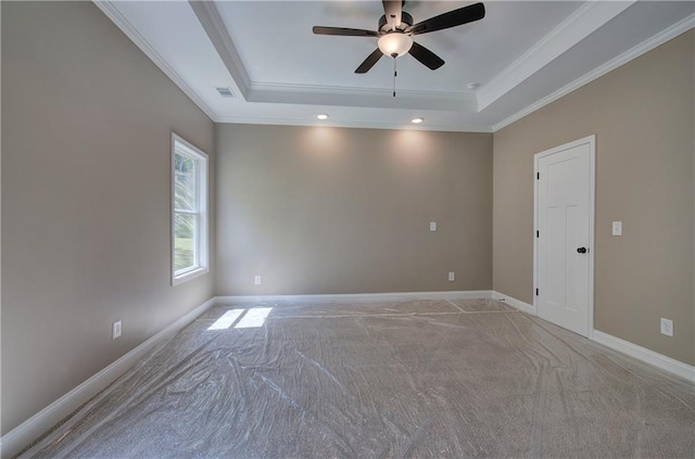 311 Arbor Cir, Rockmart, GA 30153 - empty room featuring a raised ceiling, light colored carpet, a ceiling fan, and ornamental molding