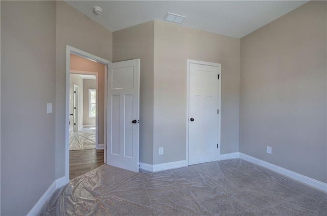 311 Arbor Cir, Rockmart, GA 30153 - unfurnished bedroom featuring baseboards