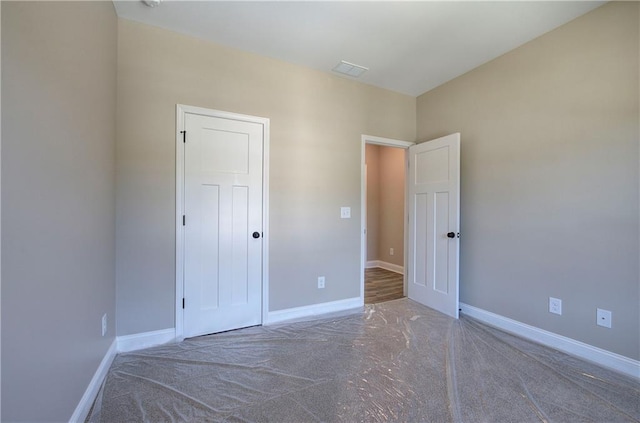 311 Arbor Cir, Rockmart, GA 30153 - unfurnished bedroom featuring carpet floors and baseboards