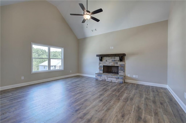 311 Arbor Cir, Rockmart, GA 30153 - unfurnished living room with high vaulted ceiling, ceiling fan, wood finished floors, and a fireplace