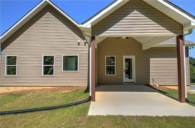 311 Arbor Cir, Rockmart, GA 30153 - rear view of house featuring a lawn and a patio