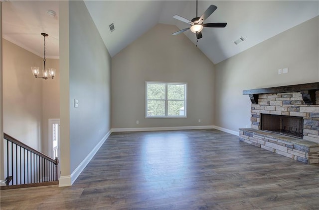 311 Arbor Cir, Rockmart, GA 30153 - unfurnished living room featuring a chandelier, a ceiling fan, a fireplace, wood finished floors, and high vaulted ceiling
