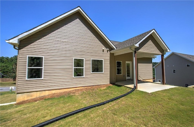 311 Arbor Cir, Rockmart, GA 30153 - back of house with a lawn and a patio area
