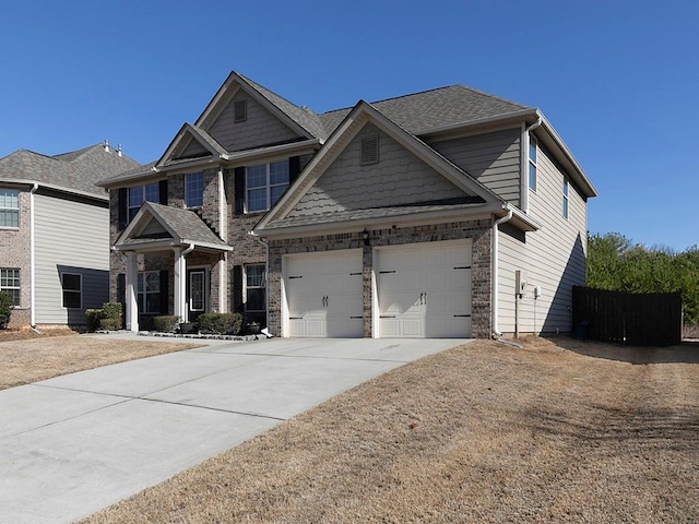 craftsman inspired home featuring a garage