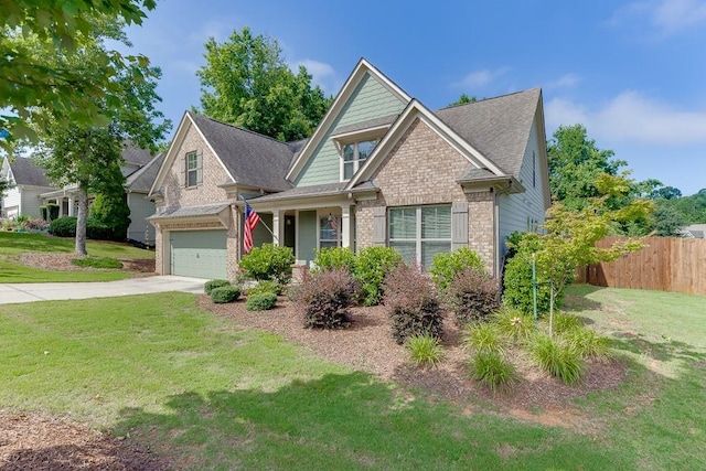 6206 Little Cove Dr, Flowery Branch, GA 30542 - craftsman inspired home featuring driveway, stone siding, an attached garage, and a shingled roof