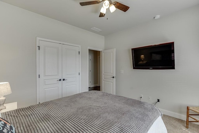 6206 Little Cove Dr, Flowery Branch, GA 30542 - bedroom featuring a closet, carpet, and a ceiling fan