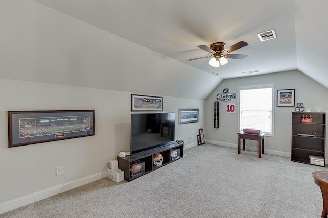 6206 Little Cove Dr, Flowery Branch, GA 30542 - carpeted living room featuring lofted ceiling and a ceiling fan