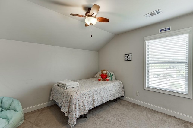 6206 Little Cove Dr, Flowery Branch, GA 30542 - bedroom with lofted ceiling, light carpet, and ceiling fan