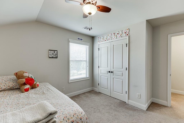 6206 Little Cove Dr, Flowery Branch, GA 30542 - bedroom featuring light carpet, lofted ceiling, a closet, and ceiling fan