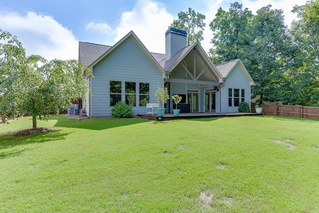 6206 Little Cove Dr, Flowery Branch, GA 30542 - rear view of property featuring a chimney and a deck