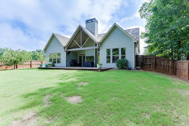 6206 Little Cove Dr, Flowery Branch, GA 30542 - rear view of property featuring a chimney, a fenced backyard, and a wooden deck
