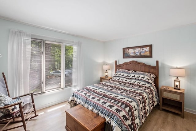 bedroom featuring wood finished floors