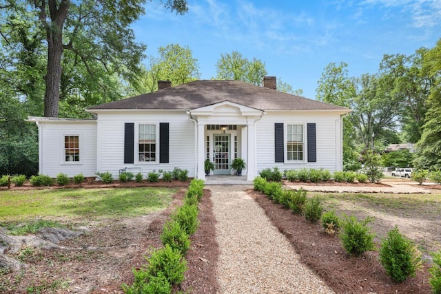 view of front of property with a chimney