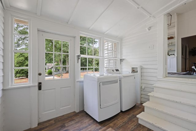 laundry room with washer and dryer and dark wood-style floors