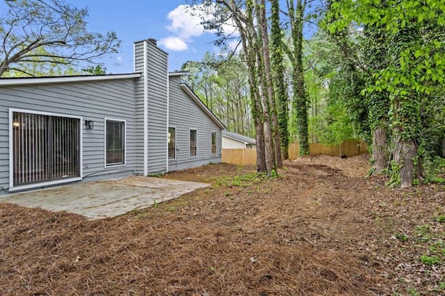 1360 Terramont Dr, Roswell, GA 30076 - back of house featuring a patio and a chimney