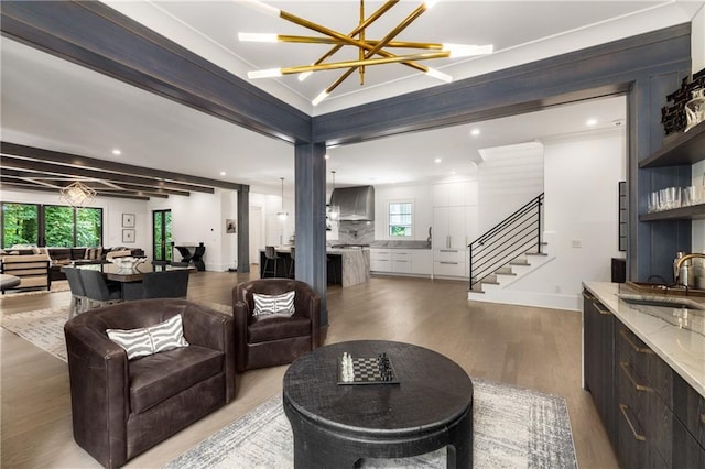 306 Pinecrest Rd NE, Atlanta, GA 30342 - living area with light wood-style floors, stairway, baseboards, recessed lighting, and a chandelier