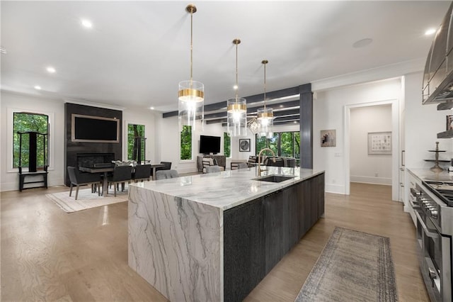 306 Pinecrest Rd NE, Atlanta, GA 30342 - kitchen with a sink, modern cabinets, open floor plan, a spacious island, and double oven range