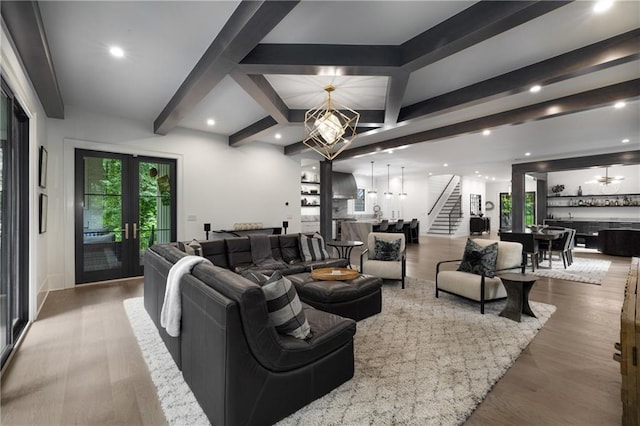 306 Pinecrest Rd NE, Atlanta, GA 30342 - living area featuring stairs, beam ceiling, wood finished floors, a chandelier, and recessed lighting