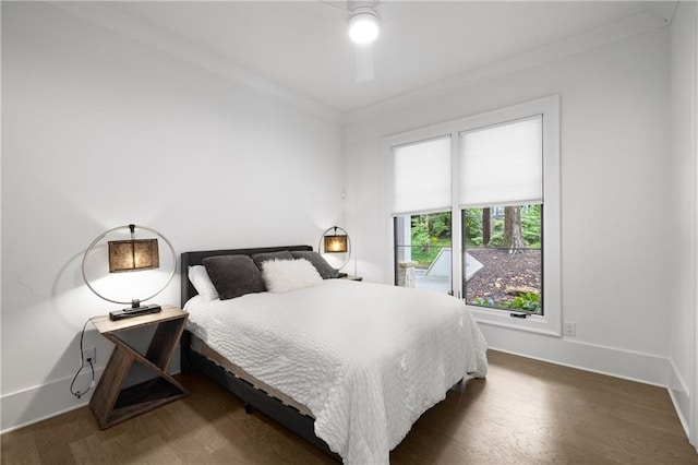 306 Pinecrest Rd NE, Atlanta, GA 30342 - bedroom with dark wood-style flooring, baseboards, ornamental molding, and a ceiling fan