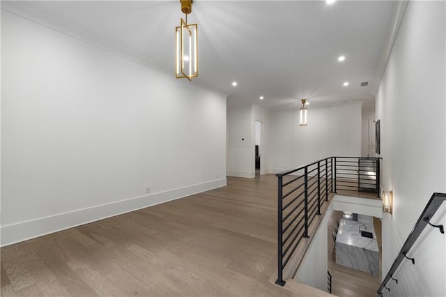 306 Pinecrest Rd NE, Atlanta, GA 30342 - stairs featuring recessed lighting, wood finished floors, baseboards, and crown molding