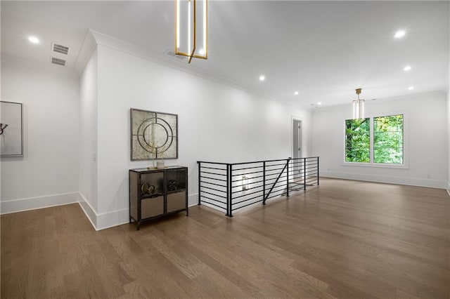 306 Pinecrest Rd NE, Atlanta, GA 30342 - empty room with baseboards, ornamental molding, wood finished floors, and recessed lighting