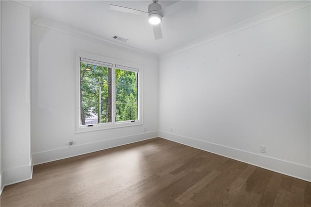 306 Pinecrest Rd NE, Atlanta, GA 30342 - empty room with dark wood-style flooring, baseboards, ornamental molding, and a ceiling fan
