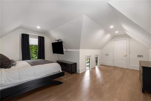 306 Pinecrest Rd NE, Atlanta, GA 30342 - bedroom with vaulted ceiling, light wood-style flooring, recessed lighting, and baseboards