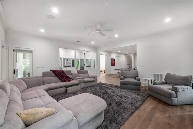 306 Pinecrest Rd NE, Atlanta, GA 30342 - living area featuring wood finished floors, ceiling fan, stairs, ornamental molding, and recessed lighting