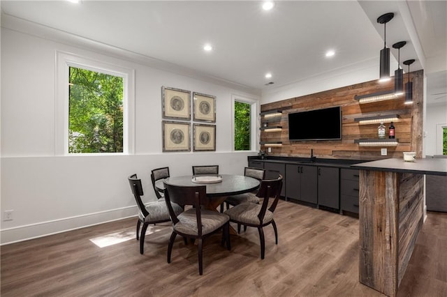 306 Pinecrest Rd NE, Atlanta, GA 30342 - dining area featuring plenty of natural light, wood walls, wood finished floors, baseboards, and recessed lighting